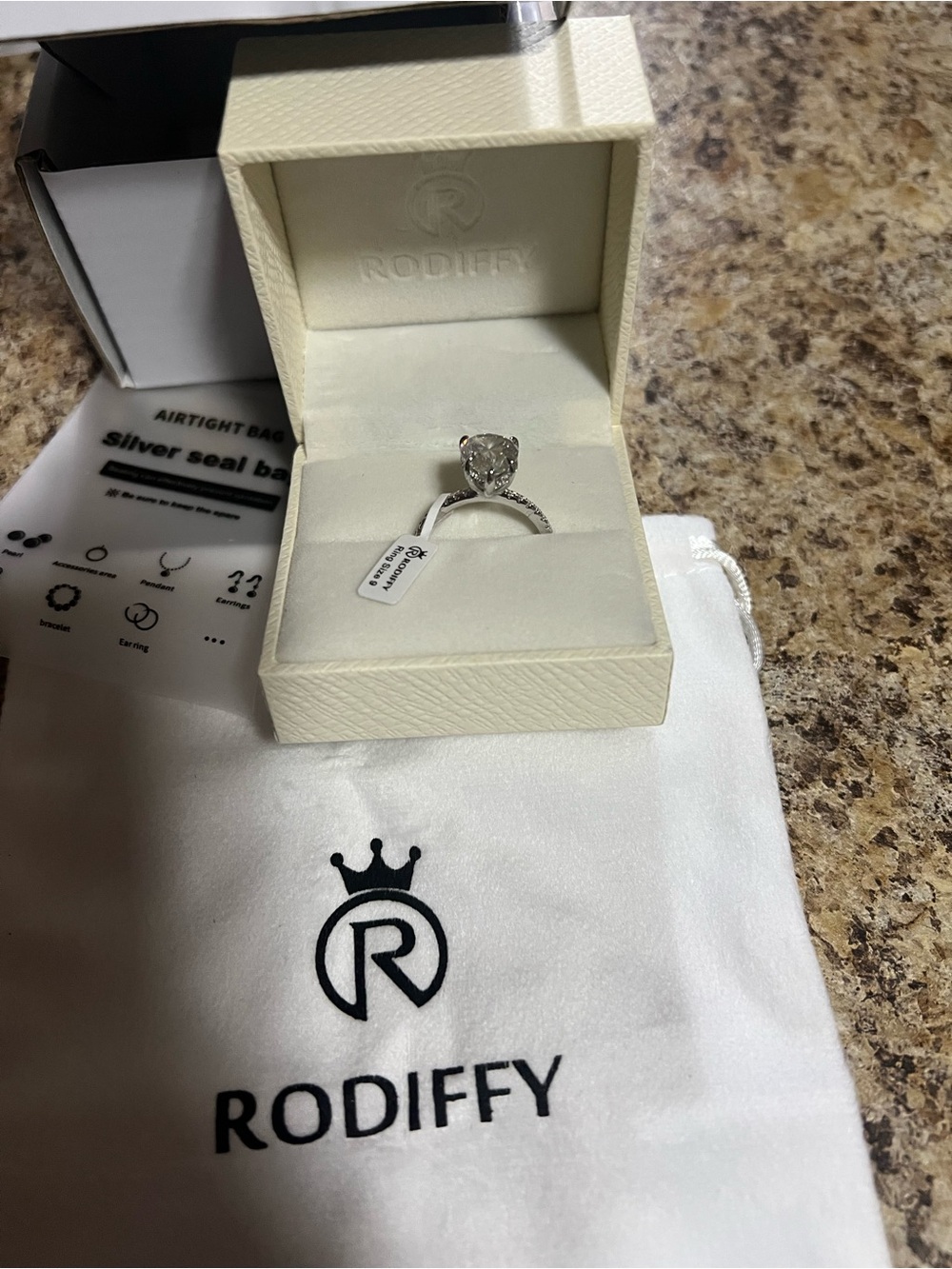 Rodiffy Silver Teardrop CZ Engagement Ring - Clear. Size 9 - Picture 2 of 10